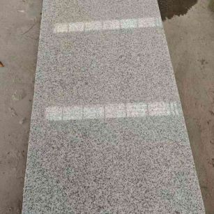 济宁芝麻白光面毛板