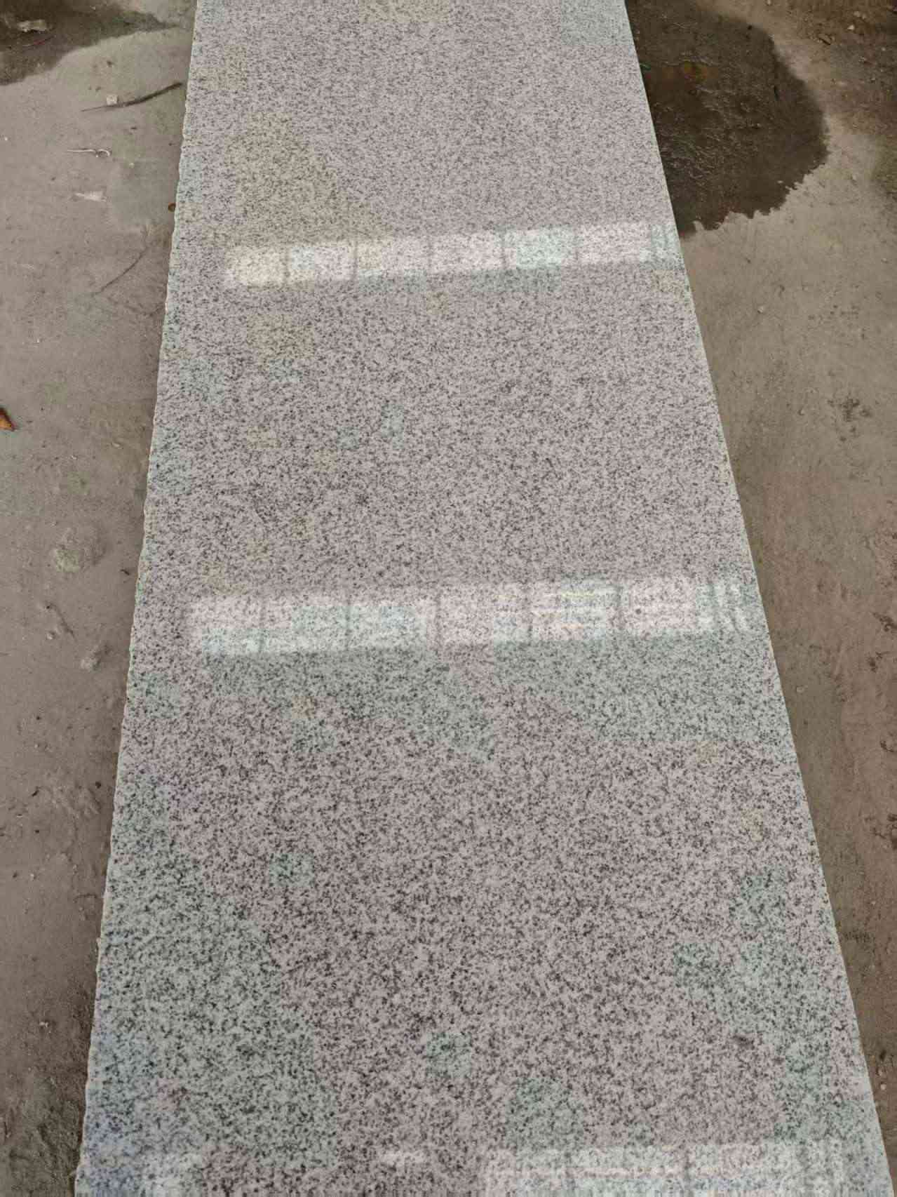 济宁芝麻白光面毛板